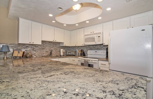 Indian Shores Condo | SALE! Palm Suite at Casa Gia Condo direct beach front/Pool & hot tub open!