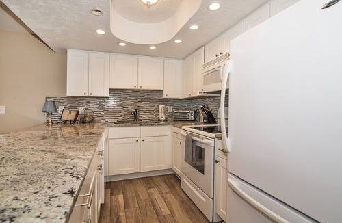 Indian Shores Condo | SALE! Palm Suite at Casa Gia Condo direct beach front/Pool & hot tub open!