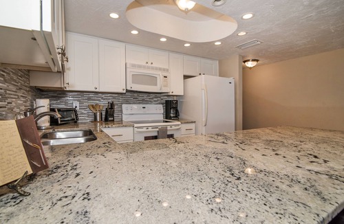 Indian Shores Condo | SALE! Palm Suite at Casa Gia Condo direct beach front/Pool & hot tub open!