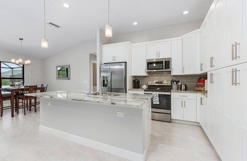 Burnt Store House | Salt water pool home with hot tub on fresh water canal and 40 foot pier 🌴