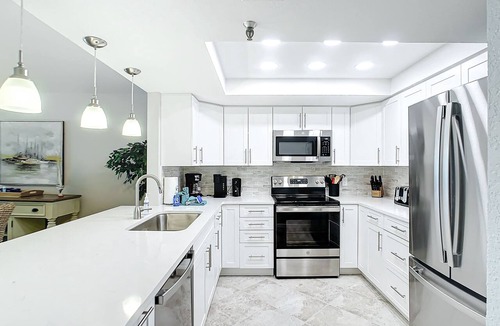 Indian Shores Condo | Sand Castle II # 2206 GULF FRONT Condo Spiral Staircase to Pool & Beach AMAZING