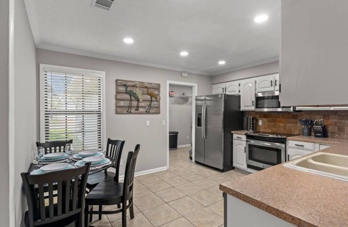 Thomas Drive House | Sandollar Sea Haven ~ Tropical Retreat with Pool, Hot Tub & Fire pit