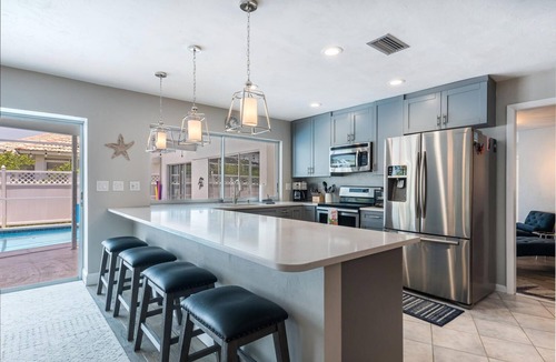 Marco Island House | Sandy Feet Retreat- Waterfront home with Private heated pool/southern exposure