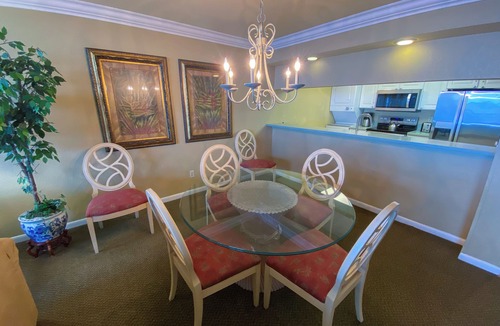 Punta Rassa Condo | Sanibel Harbour Resort Harbour Tower 315: Relaxing while watching for dolphins in the water below.