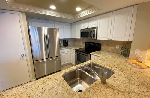 Punta Rassa Condo | Sanibel Harbour Resort: Bay View Tower 1036 Beachfront vacation retreat overlooking the water