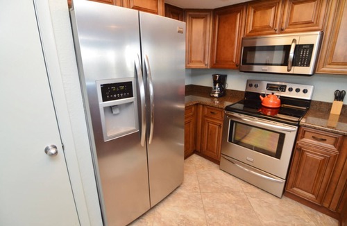 Punta Rassa Condo | Sanibel Harbour Resort Bay View Tower 837: Unwind & recharge in the wrap-around lanai.