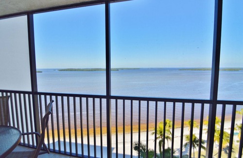Punta Rassa Condo | Sanibel Harbour Resort Bay View Tower 837: Unwind & recharge in the wrap-around lanai.
