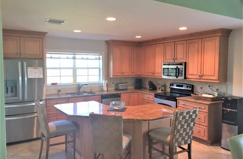 Beachview Country Club Estates House | Sanibel tranquility - 4 bedroom, 3 bathroom, heated pool, minutes walk to beach