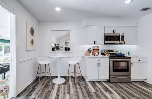 Savannah House | Savannah & Tybee Island Peach House! Pool + Hot Tub Game Room & Cabana