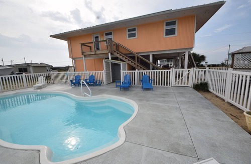 St. George Island House | Save 15% on fall stays! Steps to Beach, Gameroom, pool, hot tub, dog friendly.