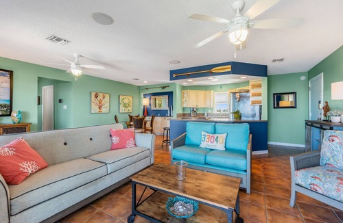 New Town Condo | SEA-NIC VIEW ~ 2 BR/2Ba Water-front views, Heated Pool Access and Dockage!