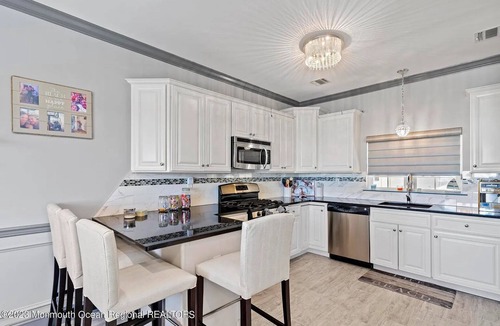 Seaside Heights Condo | Seaside Condo, 3BD+Bonus rm, 4 Bath, Rooftop deck-ocean/bay views, walk to beach