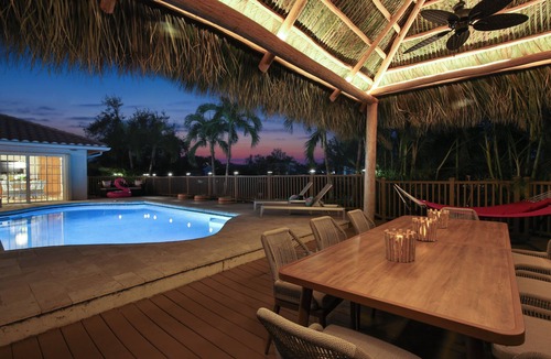 Palma Sola House | Seaside Sanctuary - 10 min to the beach, heated pool, water view, billiards