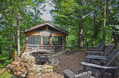 Hot Springs Cabin | Secluded 16-Acre Mountain Lodge Sleeps 12 Firepits & Mountain Views