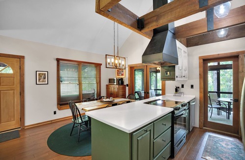 Cleveland House | Secluded 4 bedroom cabin surrounded by a nature preserve, lakes, and trails!