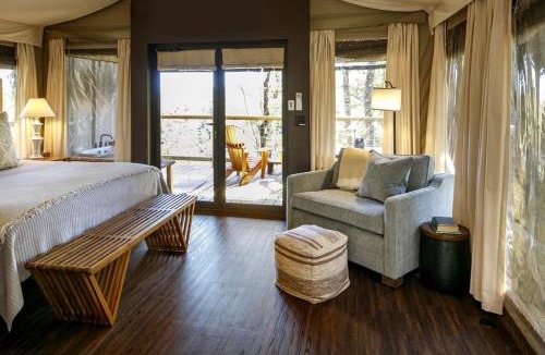 Zirconia House | Secluded Glamping Tree Tent with Outdoor Soaking Tub & Private Pizza Oven Near Waterfalls, Zirconia, NC