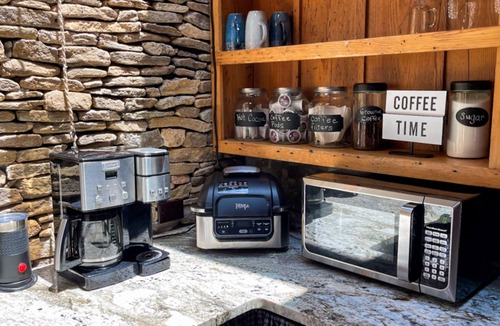 Canton Hotel | Secluded luxury cabins with water views, game table, wood stove & outdoor dining