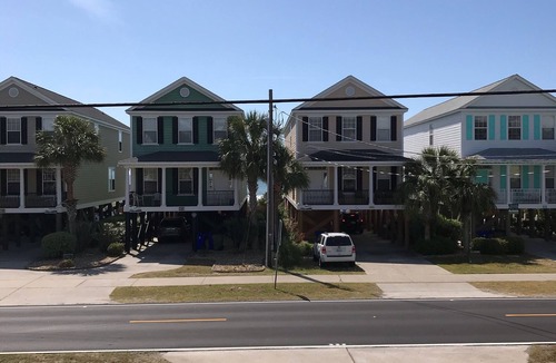 Surfside Beach House | SECOND ROW. Pool, covered parking, wifi. Monthly rates for fall, winter months.