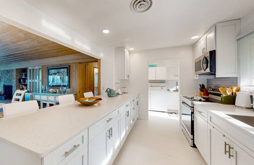 Nokomis House | Serene Beach Front Home with Outdoor dining, Private Beach & Dog-Friendly
