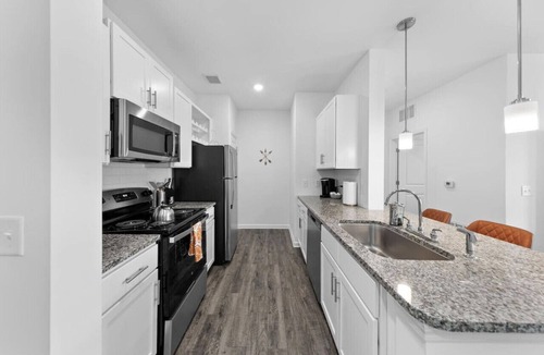 Orange Park Apartment | Serene Haven: Pool & Fitness Escape