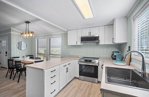 Blue Heron Lake House | Serene Island Getaway, Golf Cart Included, Pet Friendly - 101 Sea Otter