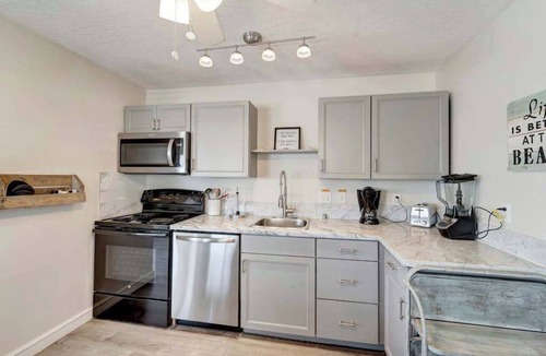 Ilexhurst Apartment | Serene oceanfront suite with Gulf view, grill, patio, central AC, & WD