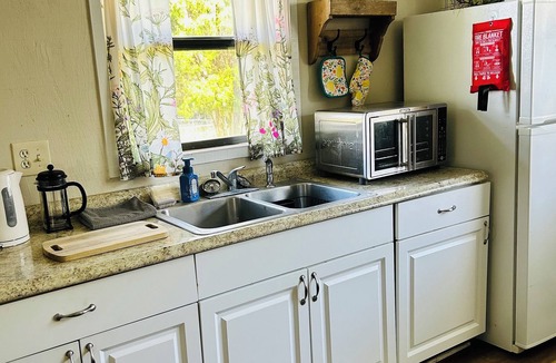 Fish Hawk House | Serene Tiny Home on Farm in Lithia Overlooks Green Space