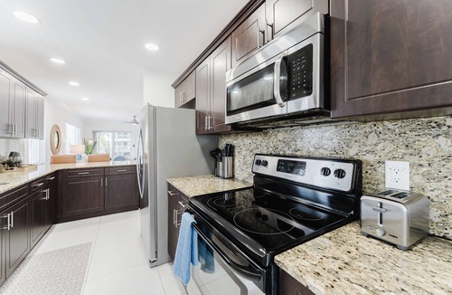 Boca Raton Apartment | Serene Waterfront 2BR 2BA with Intracoastal Views, Pool, Balcony, Parking