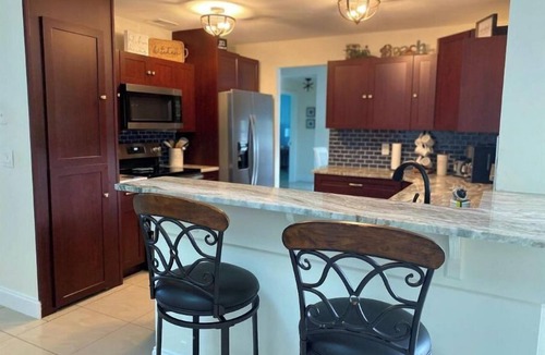 Port Malabar House | Short drive to the beach, or stay by the pool.