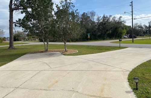Deep Creek House | Single family, 4 bedroom, 2.5 bath, 2 car garage, lanai w/pool, outdoor shower.