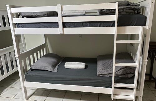 Hialeah Hostel | Single Size BOTTOM Bunk Bed - Mixed Shared ROOM