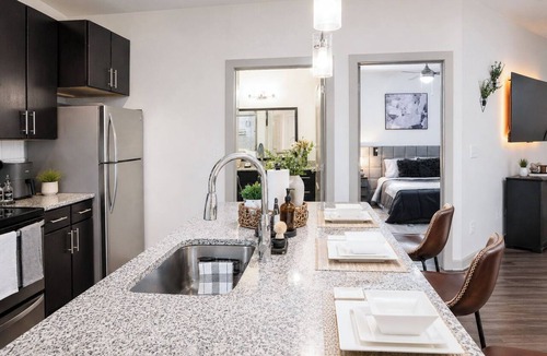 Westside Apartment | Skyline Lux Retreat: Pool & City Views