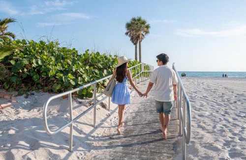 Madeira Beach Villa | Sleeps 24 Steps to the Beach Heated Pool 7BR 7BA