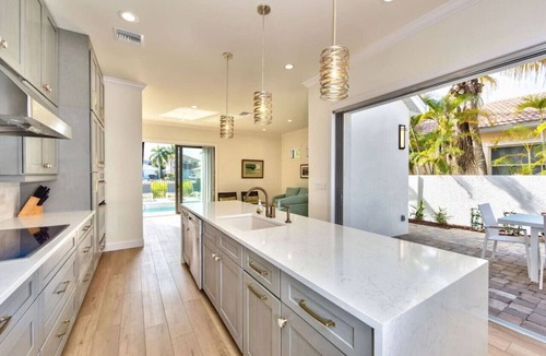 Naples Park House | Sorrento Luxury Vacation Home: Expansive 5-Bedroom, 4.5-Bath Retreat with Private Pool, Hot Tub and Pet-Friendly Accommodations. Just a Short Walk to the beach at Delnor-Wiggins State Park!