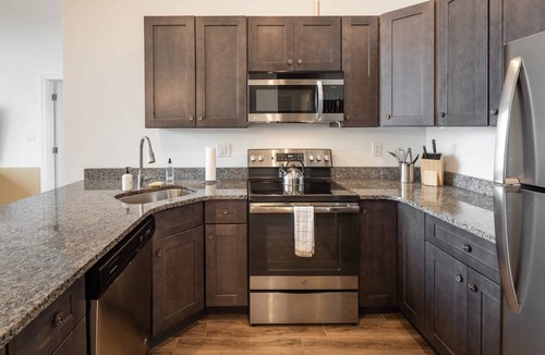 West Poplar Apartment | Sosuite | 2BR Apt w W/D, Gym, On-Site Restaurant