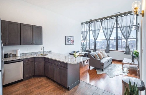 West Poplar Apartment | Sosuite | 2BR Penthouse w W/D, Gym, On-Site Bar