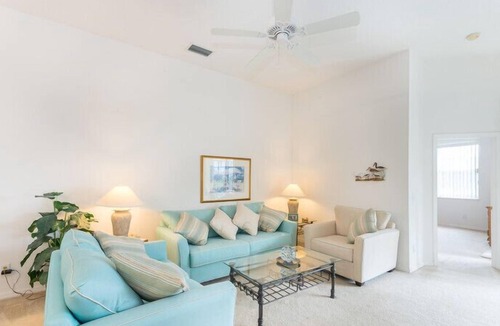 Calabay Parc Villa | South Facing Pool beside palms and grassland. Light, Spacious with Games Room ,
