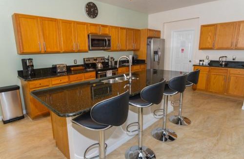 Windwood Bay House | South Facing Pool & Spa - Fenced Yard - Game Room - Family Friendly - Near Disney
