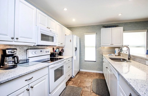 Captiva House | South Seas Beach House 15 - Direct gulf front home with pool and tennis