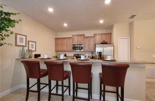 West Kissimmee House | Spacious 4BR Townhome with Private Pool and Near Disney!