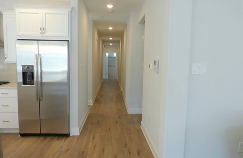 North End Condo | Spacious 5 Bedroom 4.5 Bath w/Private Elevator- 1 block from Boardwalk