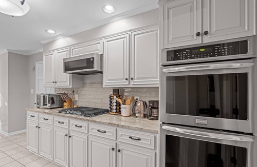 Evans House | Spacious 5-bedroom house in fabulous Evans with AC, community pool, fitness area