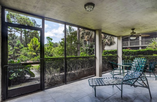 Bonita Bay Condo | Spacious, air-conditioned condo with private W/D, beach shuttle, & central AC