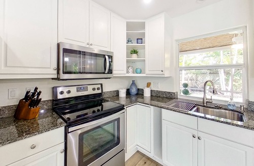 Central Naples House | Spacious & beautiful home with fast WiFi, central AC, patio, and W/D