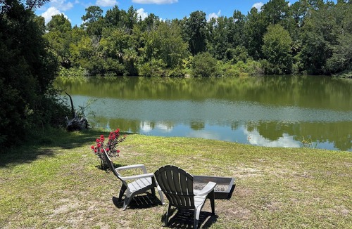Satsuma House | Spacious Caravan/RV 36 feet 2 slide outs king bed on pond immersed in nature.