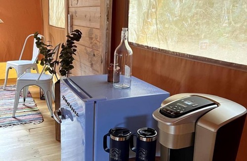 Okeechobee RV Rental | Spacious Deluxe Safari Tent with Fire Pit & BBQ Grill in Basinger, Florida