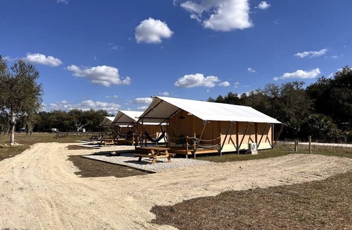 Okeechobee RV Rental | Spacious Deluxe Safari Tent with Fire Pit & BBQ Grill in Basinger, Florida