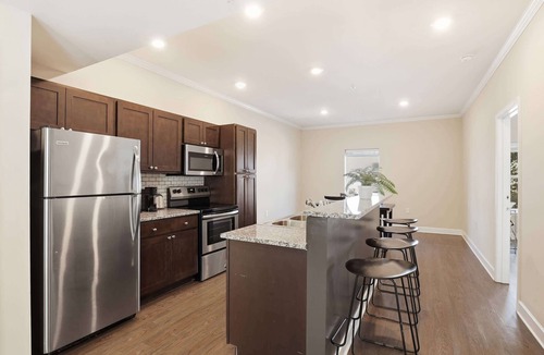 Central Condo | Spacious Haven | Hot Tub + 6-min to Garden Trails