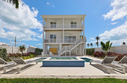 Mid Island House | Spacious NEW 5-bedroom house with pool and hot tub.
