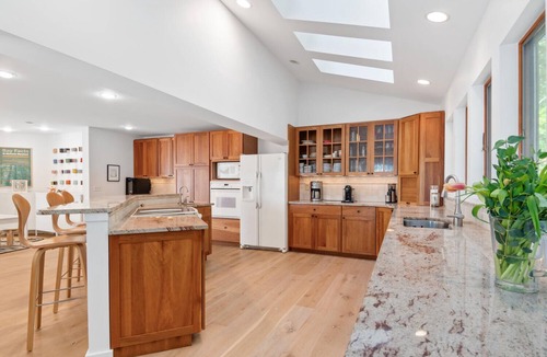 Royal Oak Cottage | Spacious waterfront house in charming Royal Oak with WiFi, AC, dock